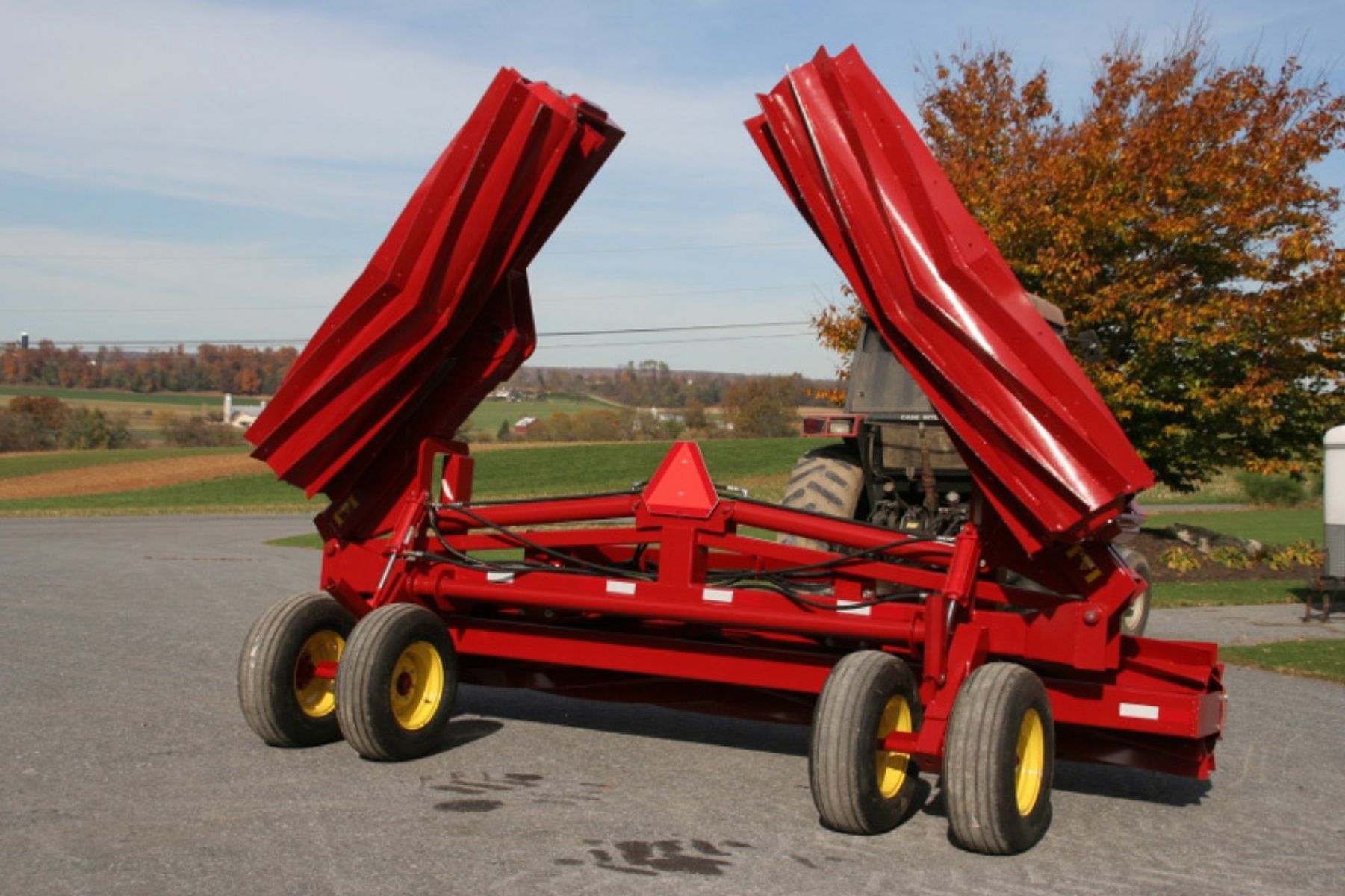 Thirty foot I & J crimper crop roller folded for transport