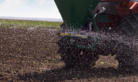 armer Applying Organic Fertilizer: